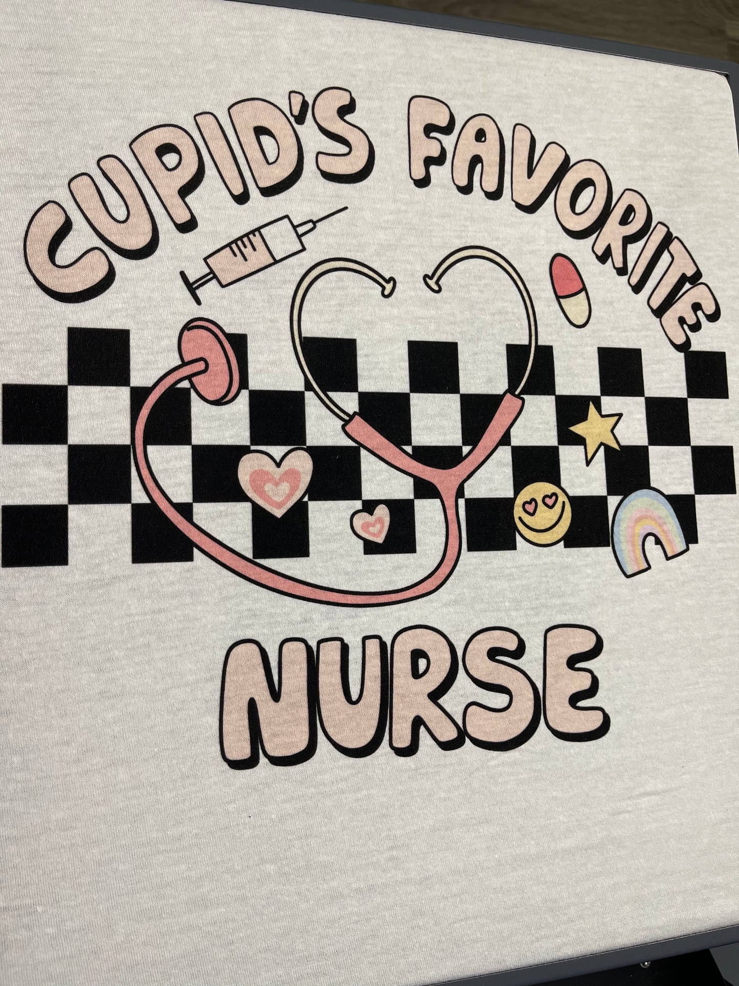 Cupid’s Favorite ~ Teacher Or Nurse graphic tee
