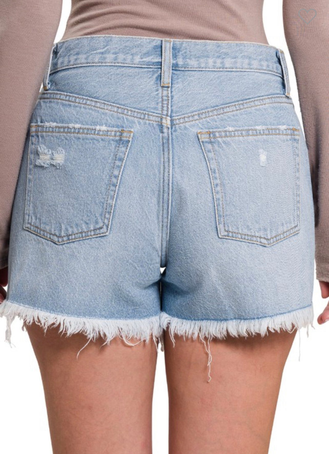 Vivi ~ Lite Wash distressed denim shorts