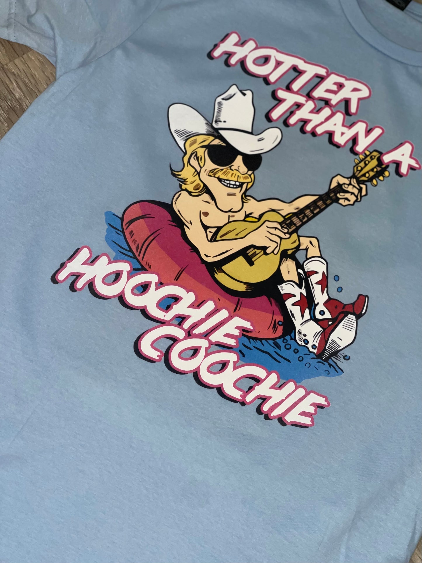 Hotter Than A Hoochie Coochie ~ Baby Blue Graphic Tee